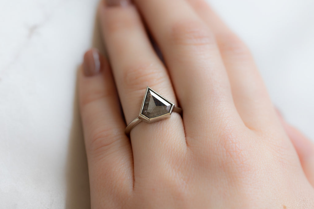 The Hazel Ring with a Black Shield-Cut Diamond on Model