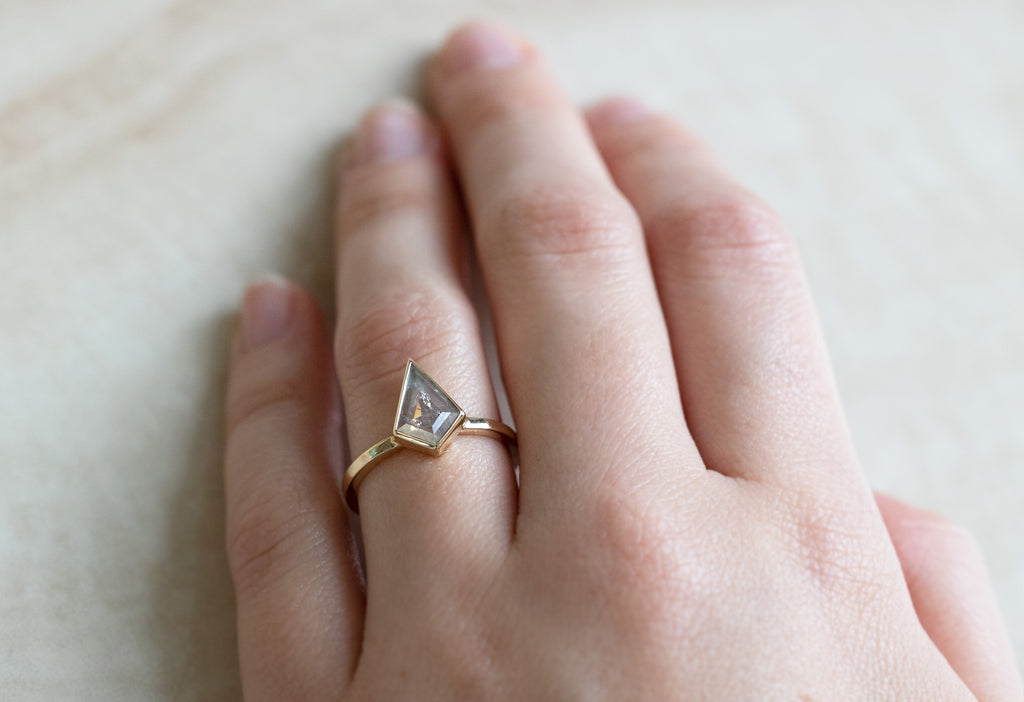 The Hazel Ring with a Grey Opalescent Kite Diamond on Model