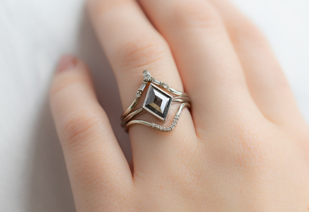 The Hazel Ring with a Kite-Shaped Salt and Pepper Diamond with White Diamond Stacking Bands on Model