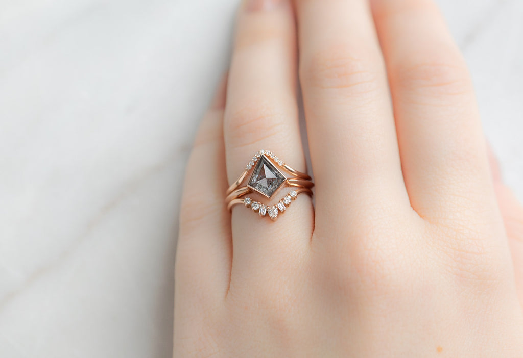 The Hazel Ring with a Kite-Shaped Salt and Pepper Diamond with White Diamond Stacking Bands on Model