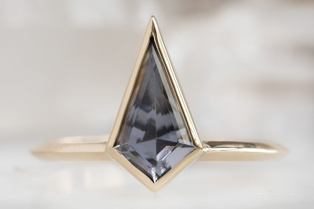The Hazel Ring with a Kite Shaped Spinel