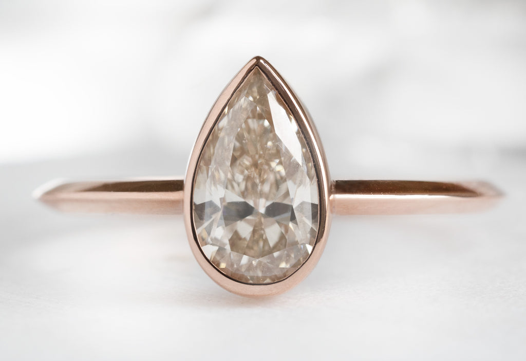 The Hazel Ring with a Pear-Cut Pink Diamond