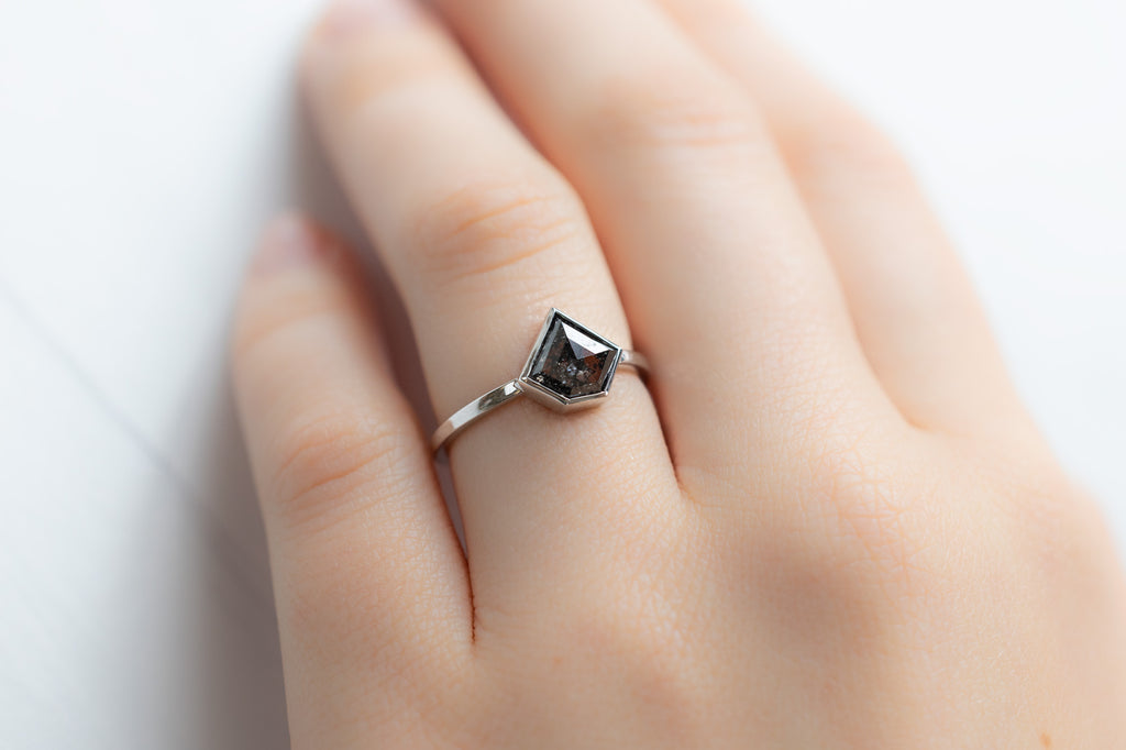 The Hazel Ring with a Shield-Cut Black Diamond on Model