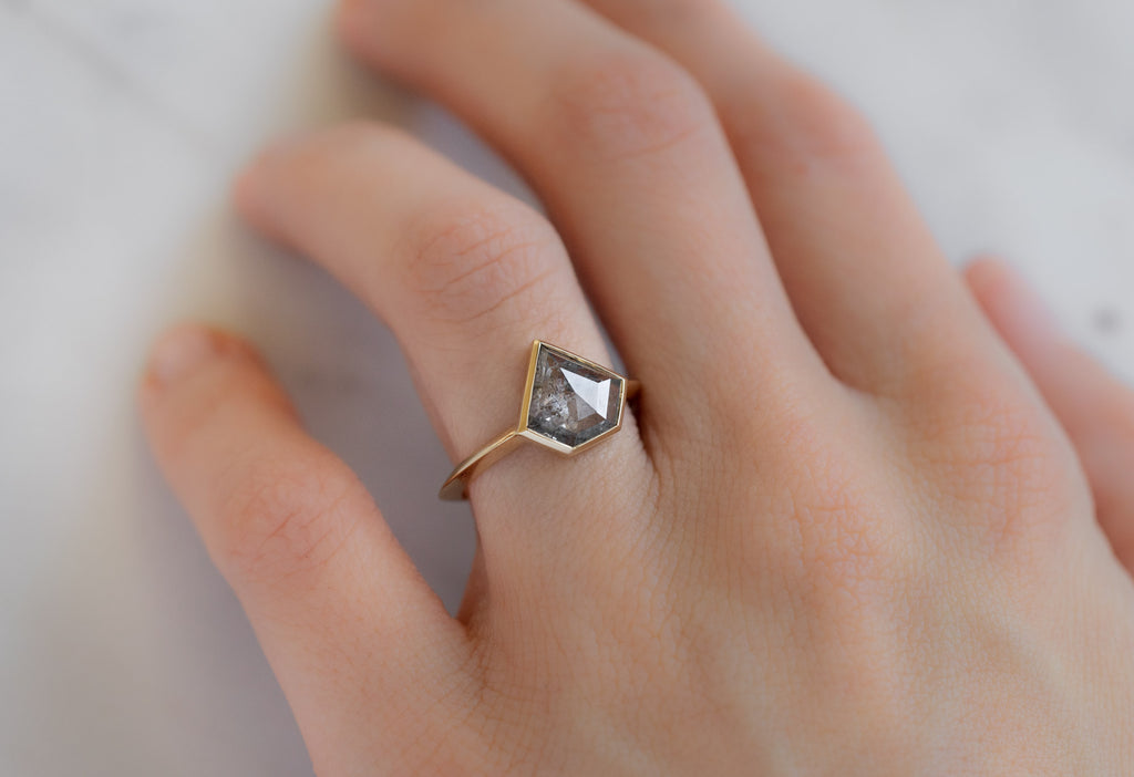 The Hazel Ring with a Shield-Cut Salt and Pepper Diamond on Model