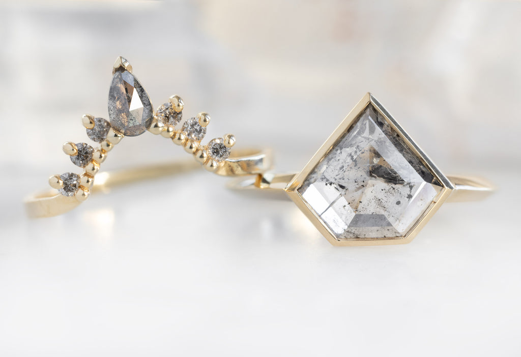 The Hazel Ring with a Shield-Cut Salt and Pepper Diamond with Stacking Bands