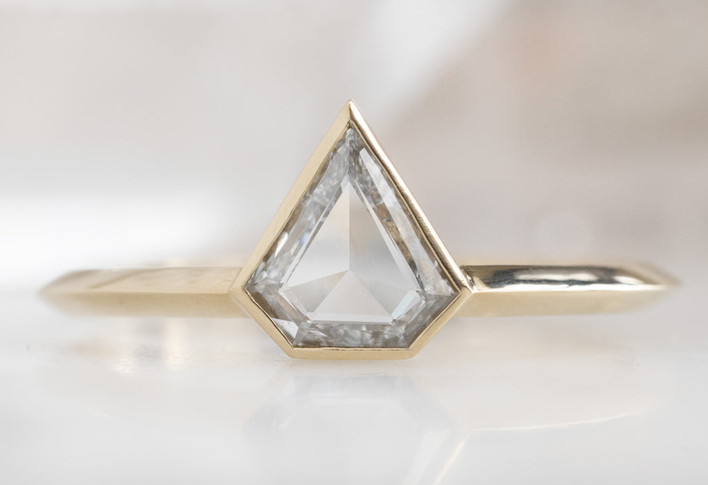 The Hazel Ring with a Shield-Cut White Diamond