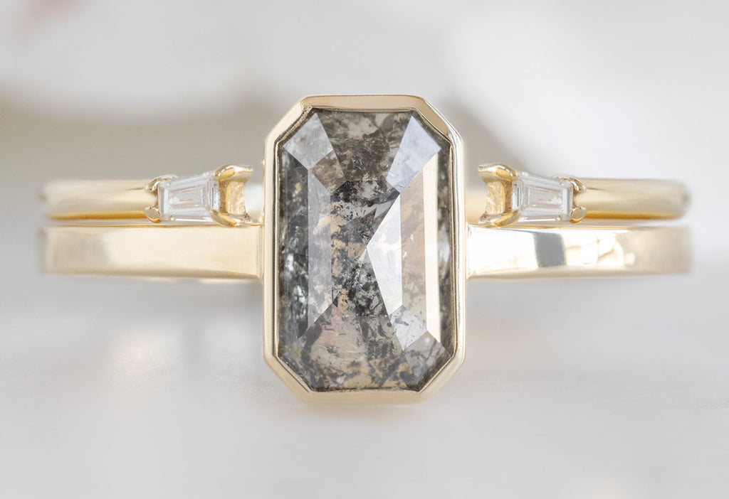 The Hazel Ring with an Emerald-Cut Salt and Pepper Diamond with Open Cuff Baguette Stacking Band