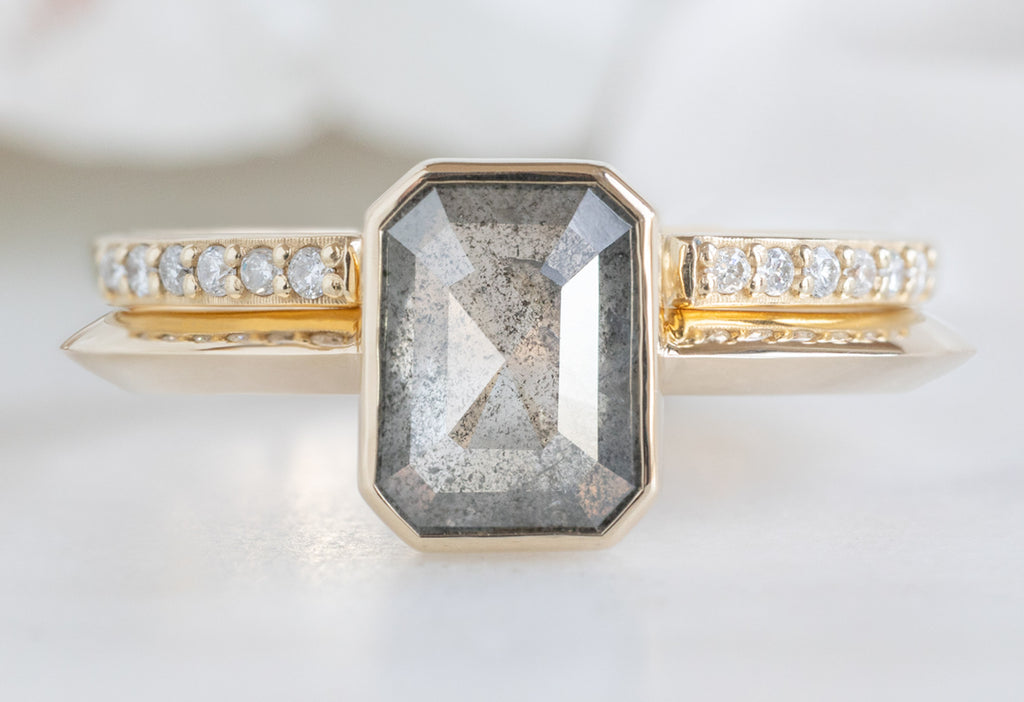 The Hazel Ring with an Emerald-Cut Salt and Pepper Diamond with Open Cuff Pavé Stacking Band
