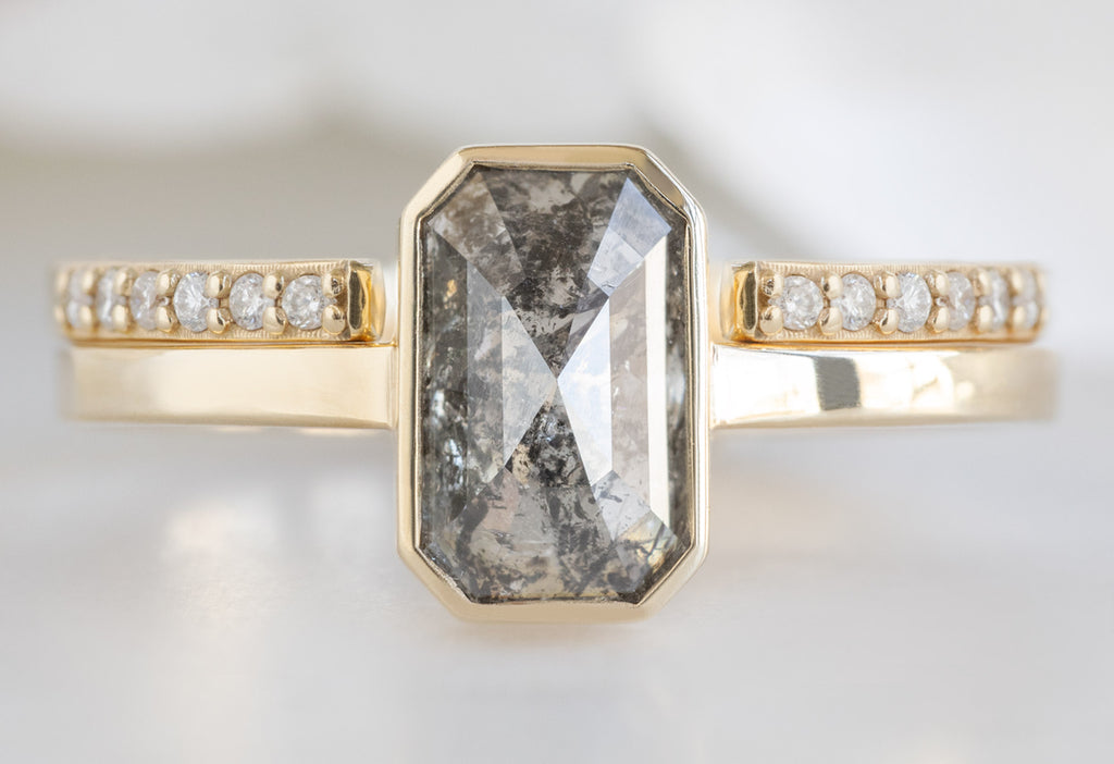 The Hazel Ring with an Emerald-Cut Salt and Pepper Diamond with Open Cuff Pavé Diamond Stacking Band