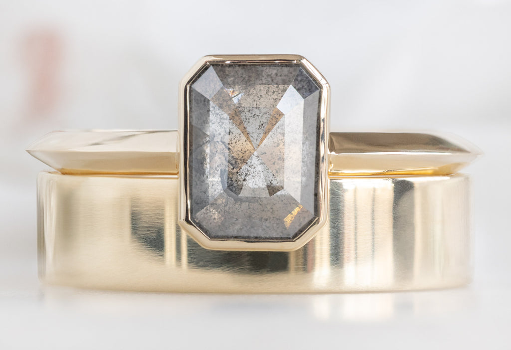 The Hazel Ring with an Emerald-Cut Salt and Pepper Diamond with Unisex Gold Stacking Band
