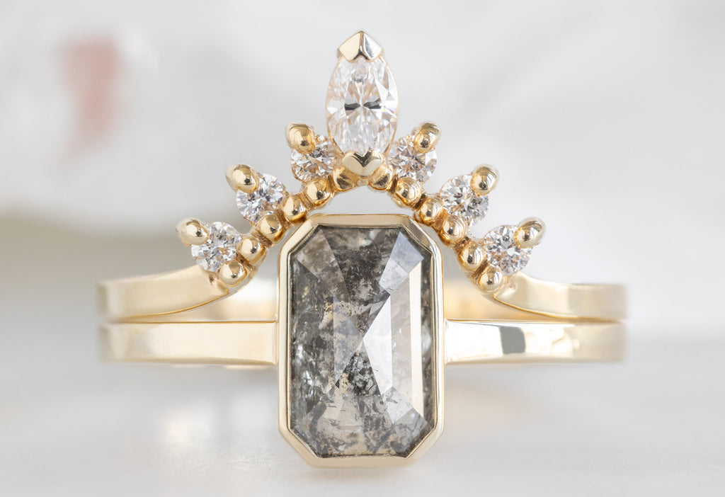 The Hazel Ring with an Emerald-Cut Salt and Pepper Diamond with White Diamond Sunburst Stacking Band