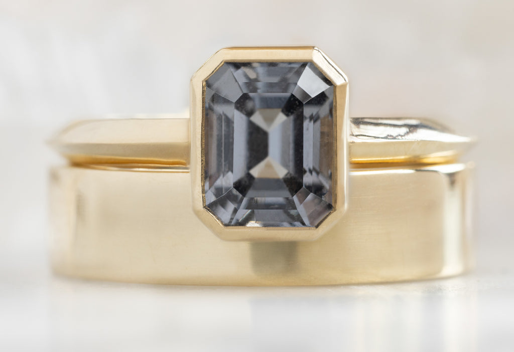 The Hazel Ring with an Emerald-Cut Spinel with Gold Cut Out Stacking Band