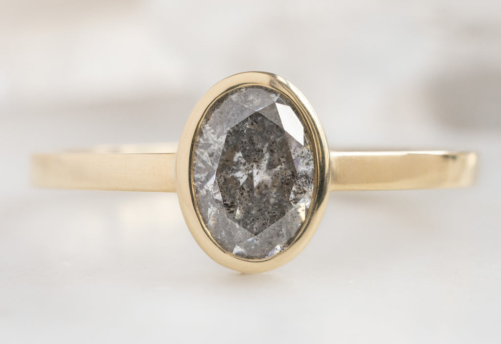 The Hazel Ring with an Oval-Cut Salt and Pepper Diamond