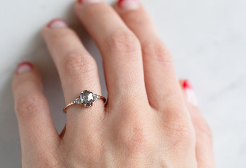 The Ivy Ring with a Black Hexagon Diamond on Model