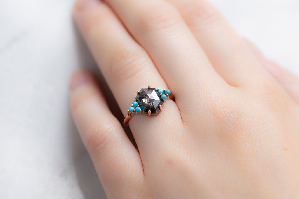 The Ivy Ring with a Black Hexagon Diamond on Model