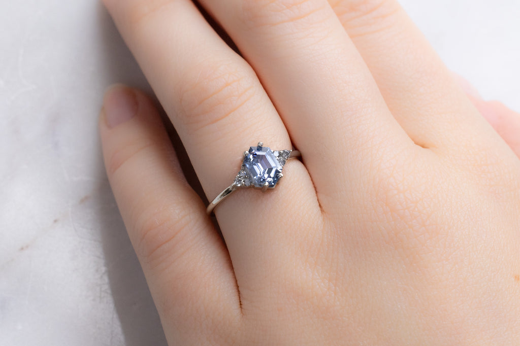The Ivy Ring with a Blue Violet Sapphire on Model