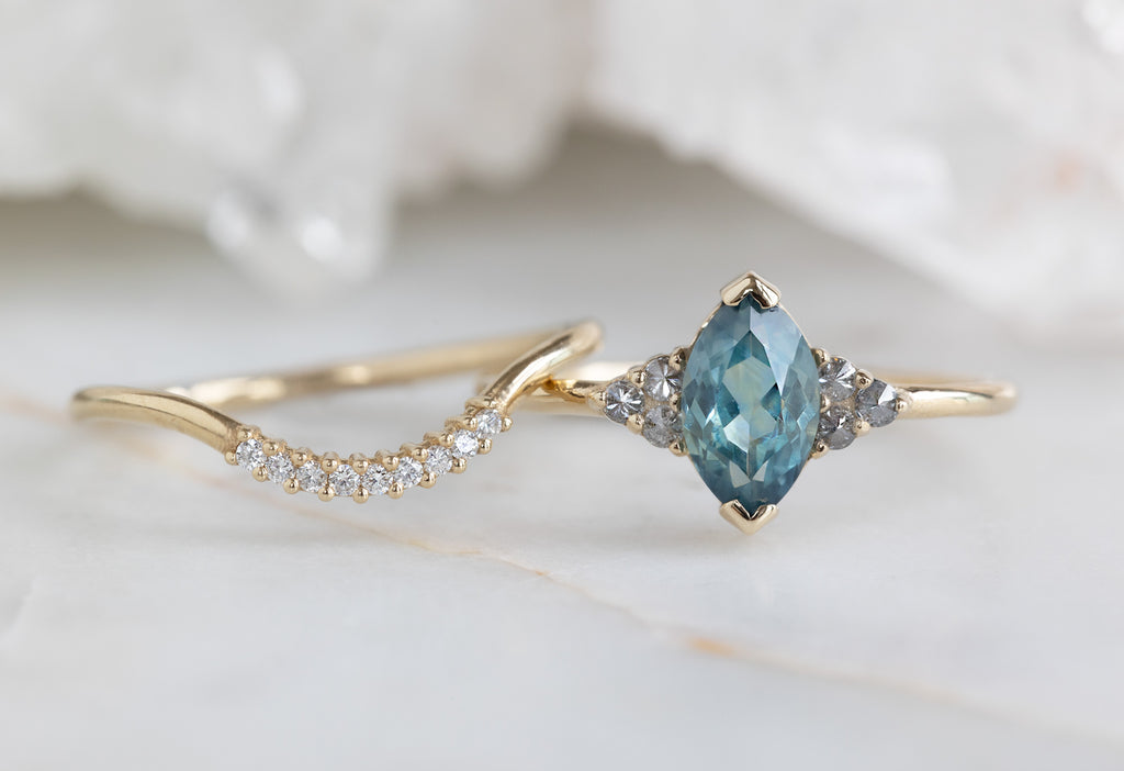 The Ivy Ring with a Marquise Sapphire with stacking band