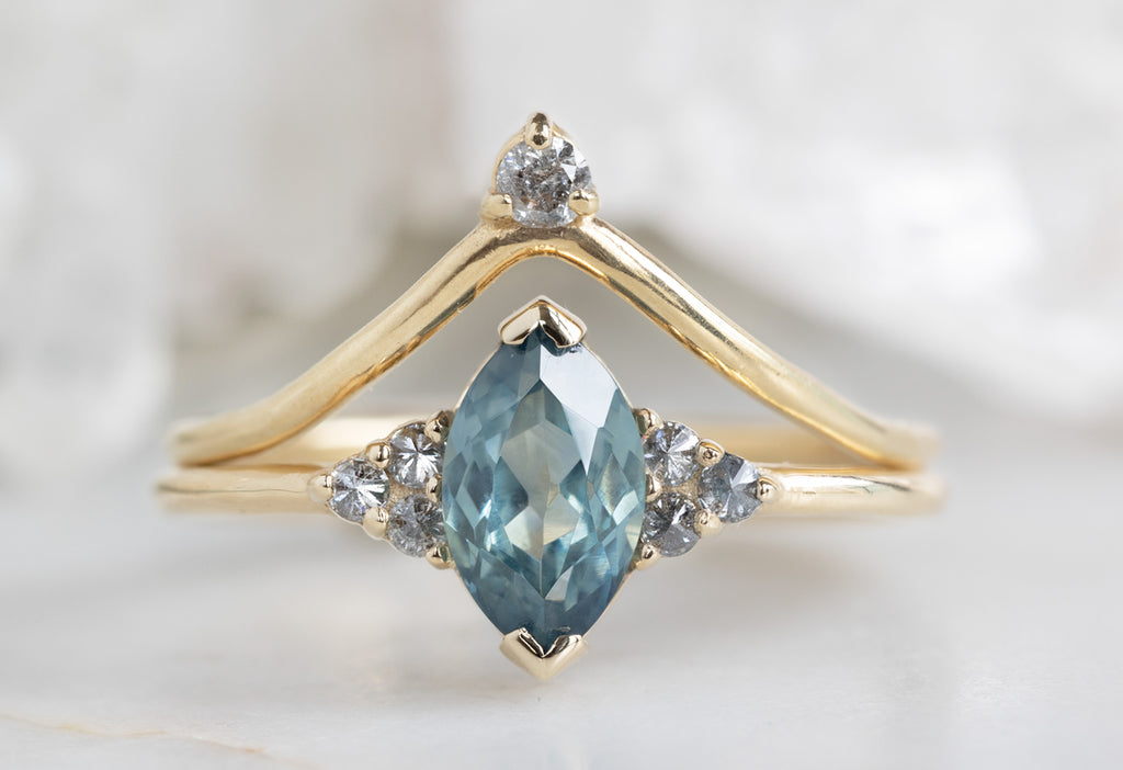 The Ivy Ring with a Marquise Sapphire with stacking band