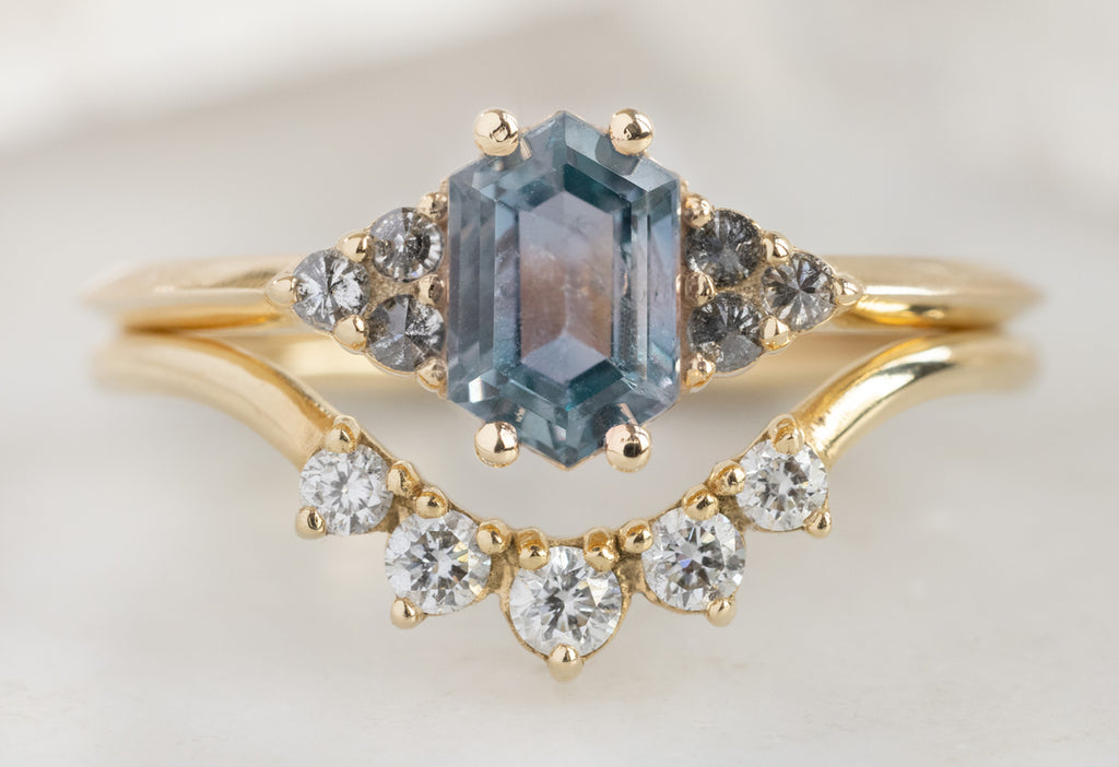 The Ivy Ring with a Montana Sapphire Hexagon with Round White Diamond Sunburst