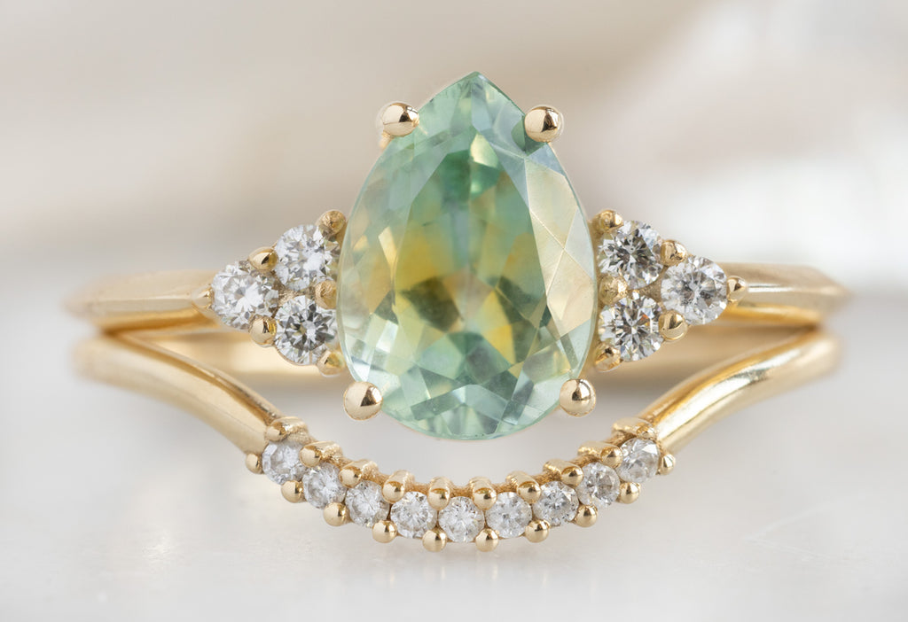 The Ivy Ring with a Pear-Cut Bicolor Sapphire with Pavé Arc Stacking Band