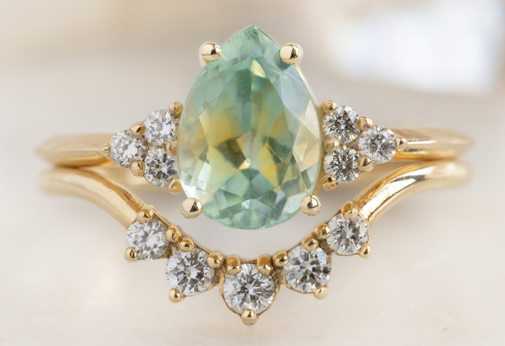 The Ivy Ring with a Pear-Cut Bicolor Sapphire with Round White Diamond Sunburst Stacking Band