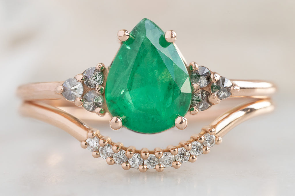 The Ivy Ring with a Pear-Cut Emerald with Stacking Band