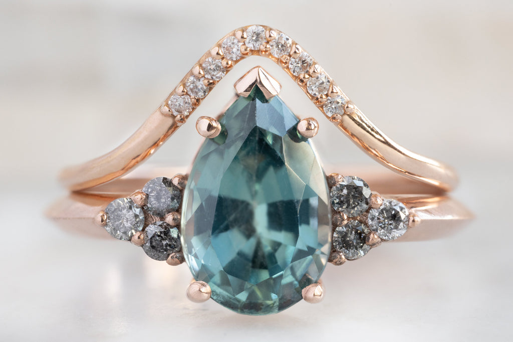 The Ivy Ring with a Pear-Cut Montana Sapphire with Pavé Arc Stacking Band