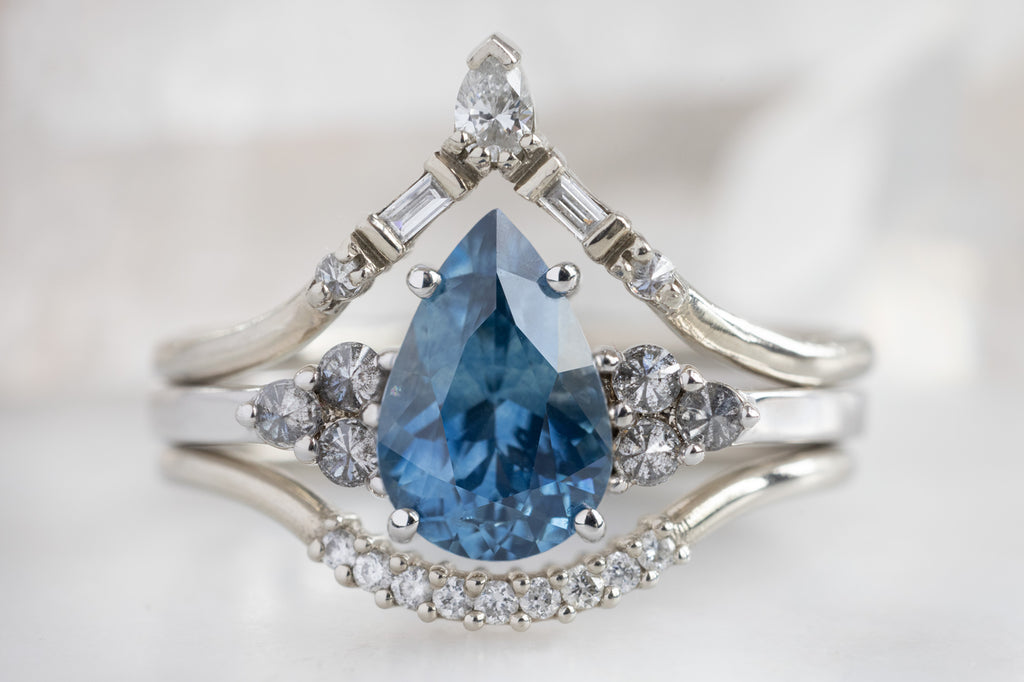 The Ivy Ring with a Pear-Cut Montana Sapphire  with Stacking Bands