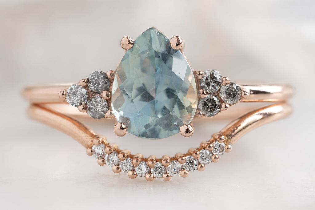 The Ivy Ring with a Pear-Cut Montana Sapphire with White Diamond Stacking Band