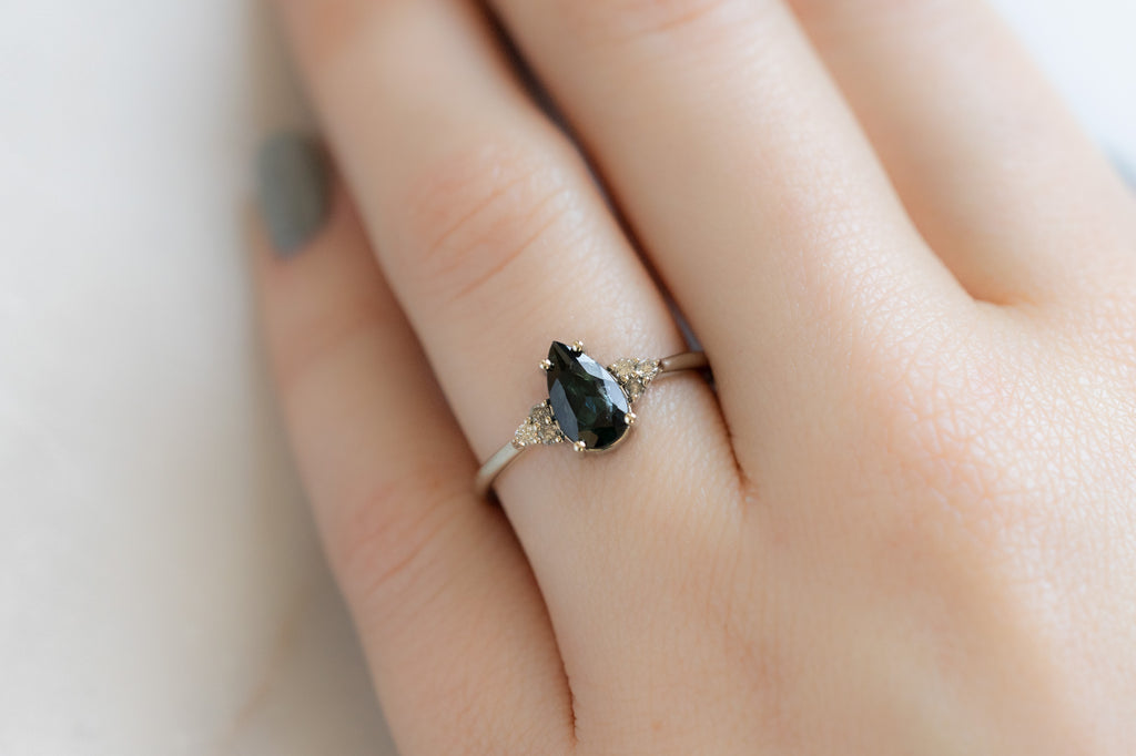The Ivy Ring with a Pear-Cut Sapphire on Model