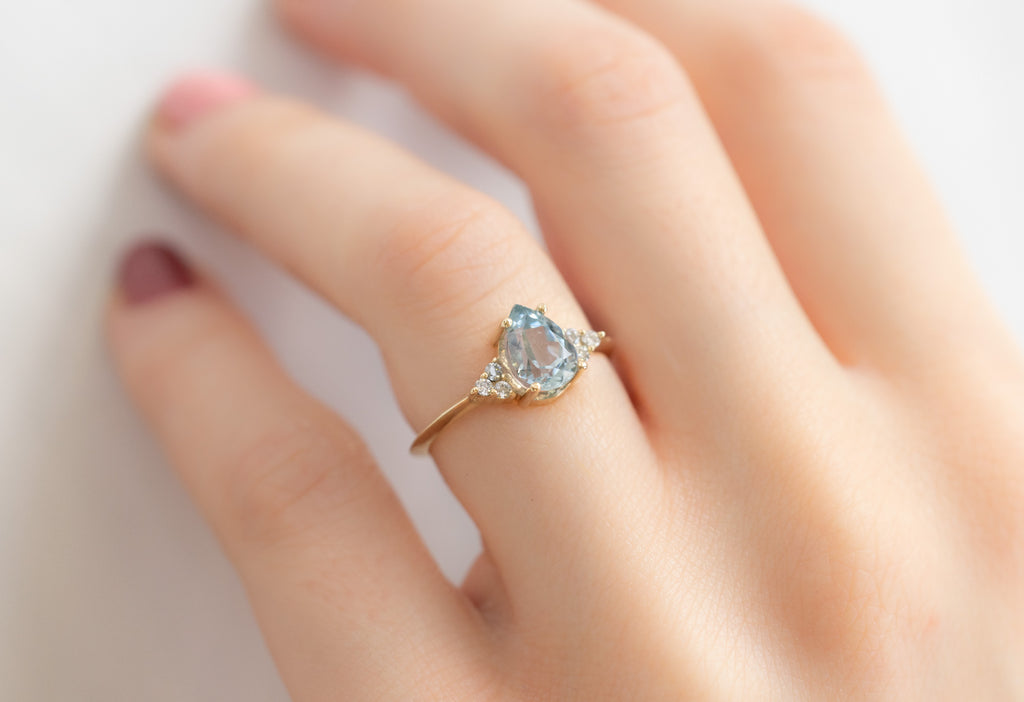 The Ivy Ring with a Pear-Cut Sapphire on Model
