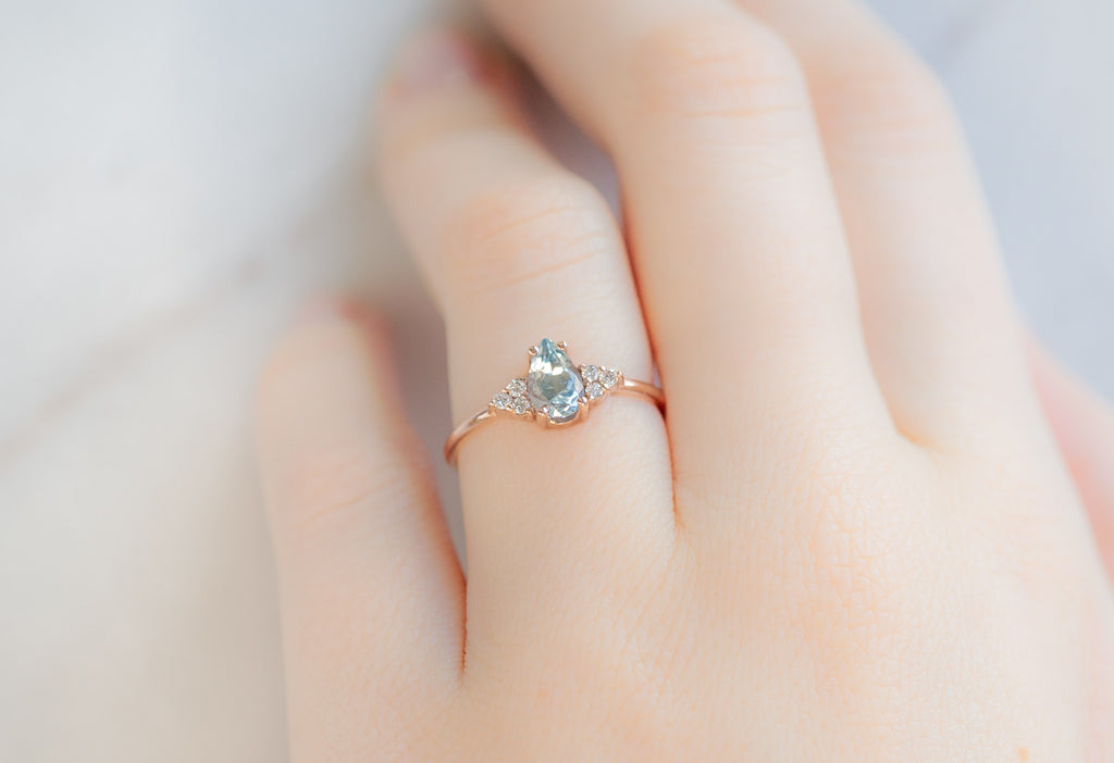 The Ivy Ring with a Pear-Cut Sapphire on Model