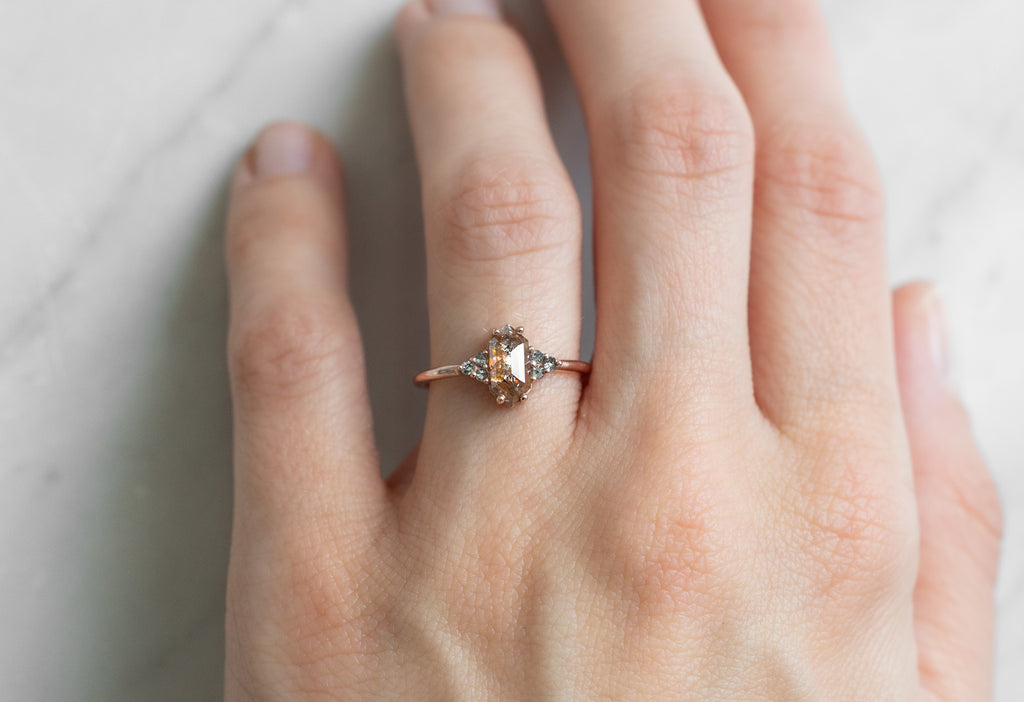 The Ivy Ring with a Red Hexagon Diamond on Model