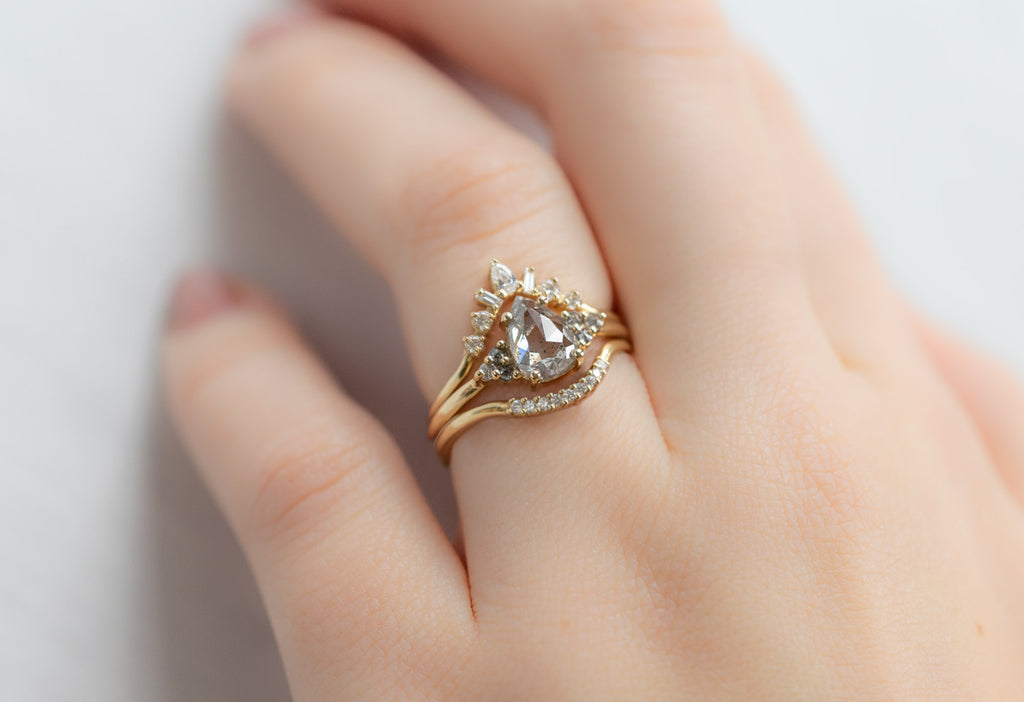 The Ivy Ring with a Rose-Cut Salt and Pepper Diamond with White Diamond Stacking Bands on Model