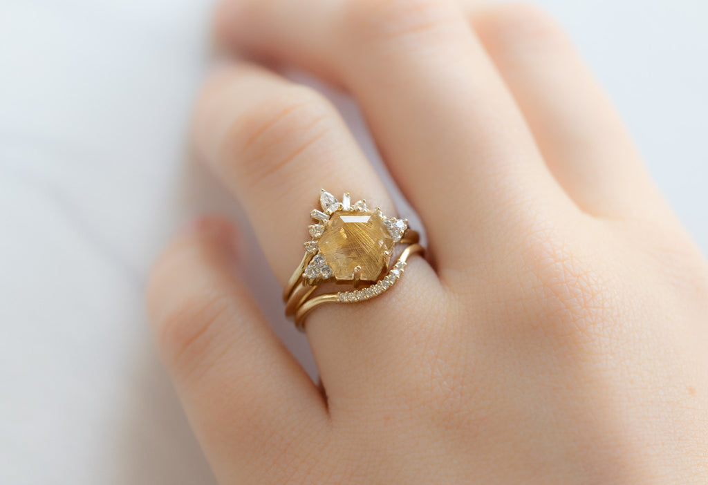The Ivy Ring with a Rutilated Quartz Hexagon with Stacking Bands on Model