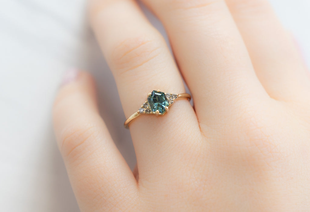 The Ivy Ring with a Sapphire Hexagon on Model