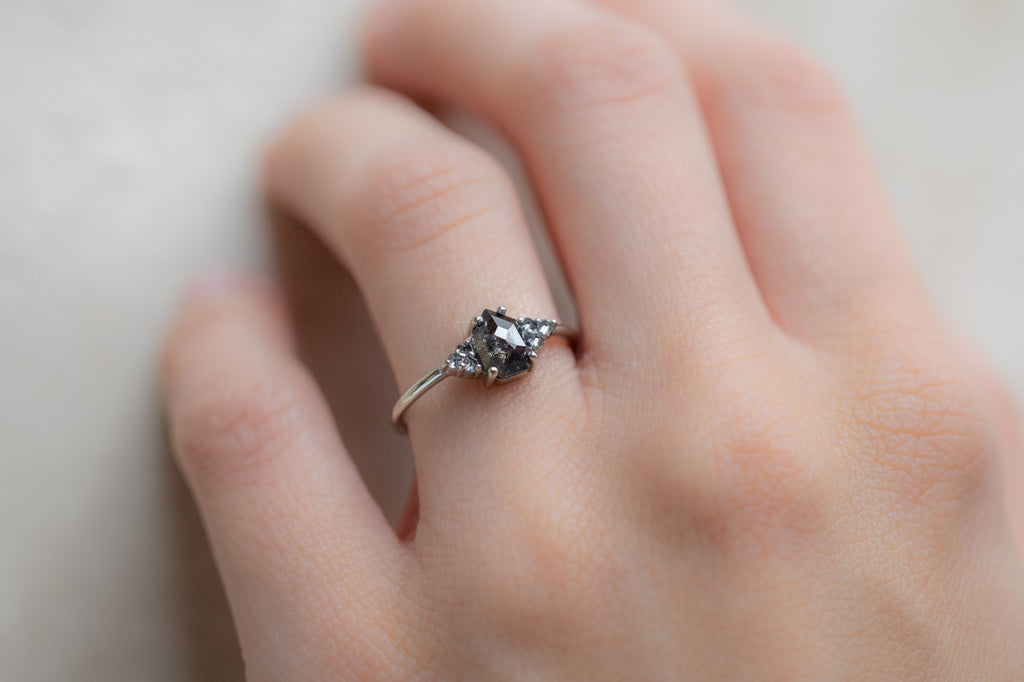 The Ivy Ring with a Shield-Cut Black Diamond on Model