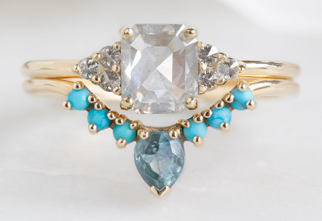 The Ivy Ring with an Emerald-Cut Opalescent Diamond with Sapphire and Turquoise Stacking Band