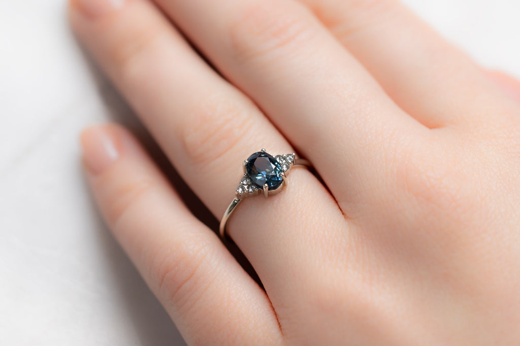 The Ivy Ring with an Oval-Cut Montana Sapphire on Model