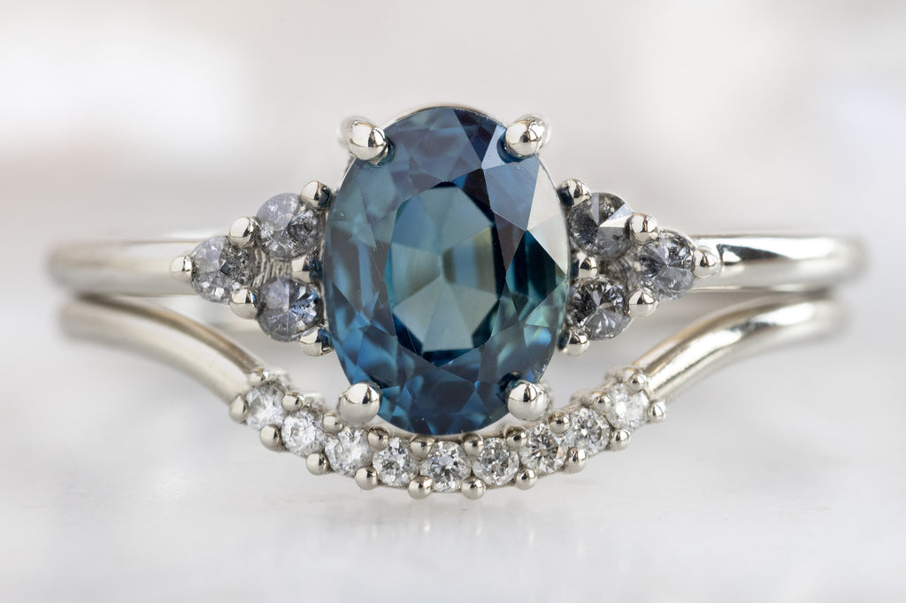 The Ivy Ring with an Oval-Cut Montana Sapphire with White Diamond Stacking Band