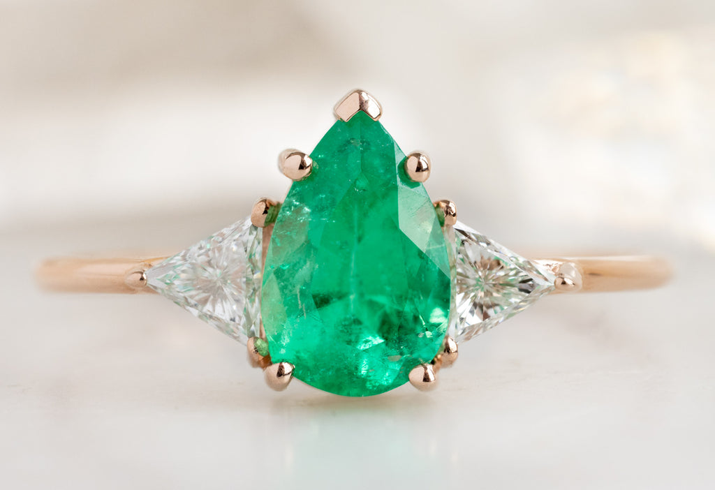 The Jade Ring with a Pear-Cut Emerald