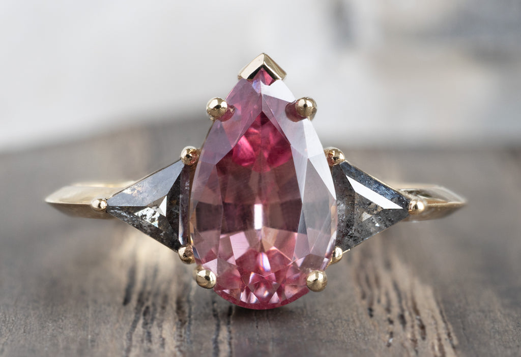 The Jade Ring with a Pear-Cut Malaya Garnet