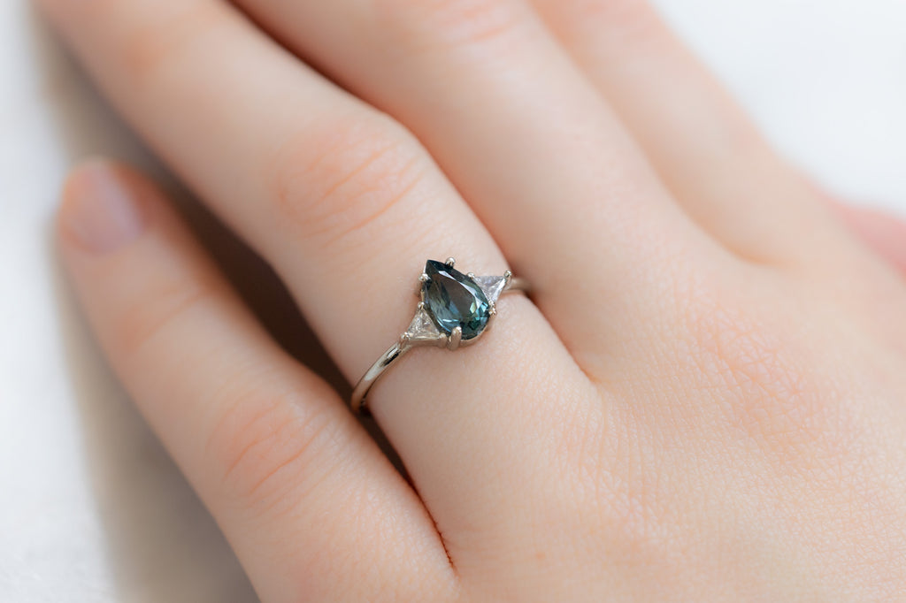 The Jade Ring with a Pear-Cut Montana Sapphire on Model