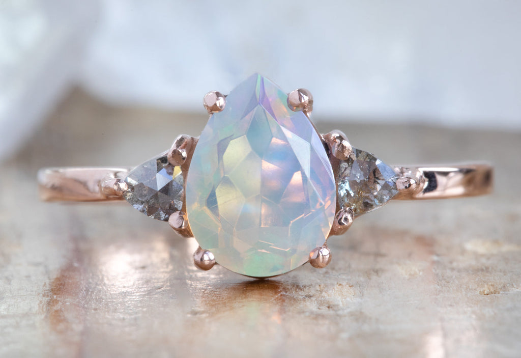 The Jade Ring with a Pear-Cut Opal