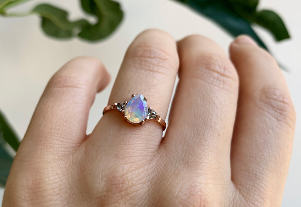 The Jade Ring with a Pear-Cut Opal on Model