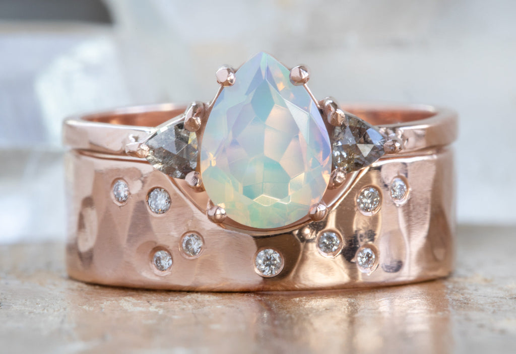 The Jade Ring with a Pear-Cut Opal with Stacking Bands