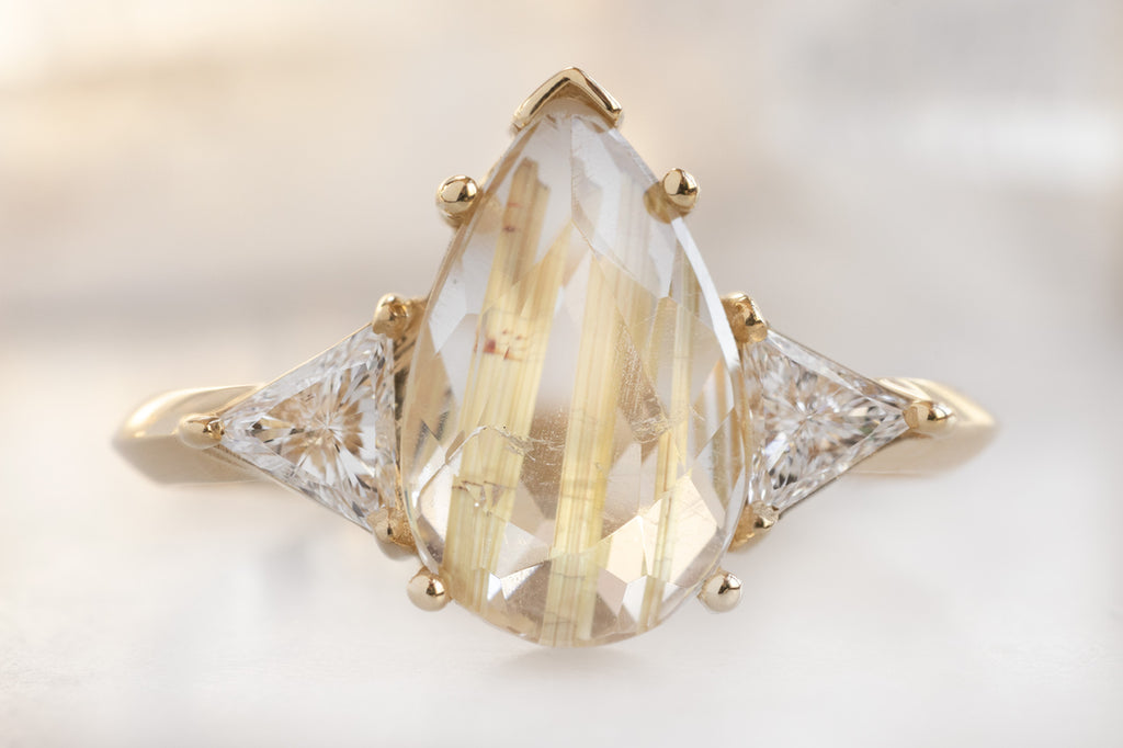 The Jade Ring with a Pear-Cut Rutiliated Quartz