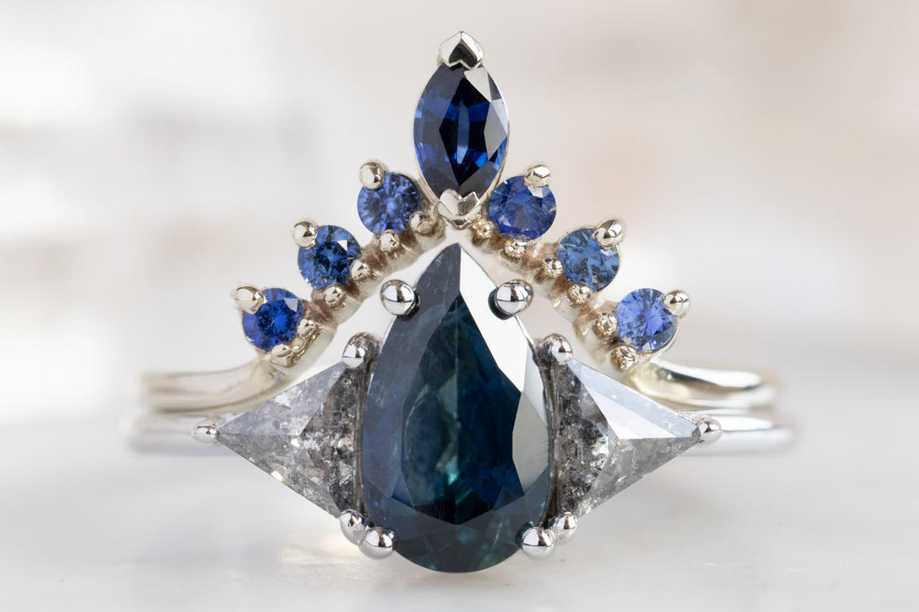 The Jade Ring with a Pear-Cut Sapphire with Sapphire Sunburst Stacking Band