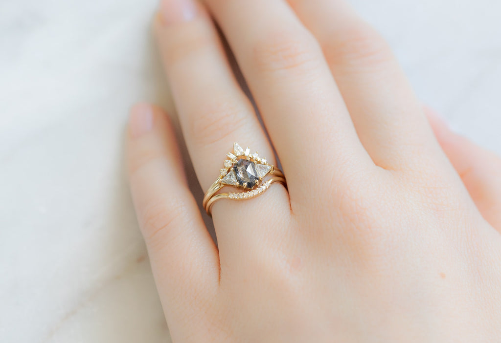 The Jade Ring with a Salt and Pepper Hexagon Diamond with White Diamond Stacking Bands on Model