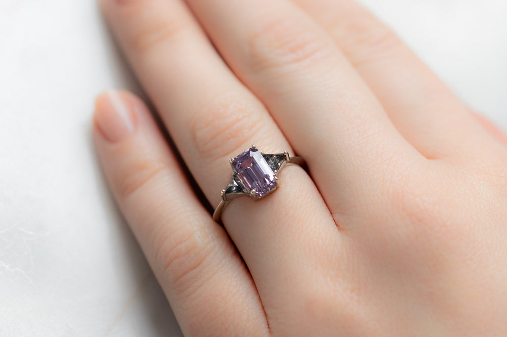 The Jade Ring with an Emerald-Cut Purple Sapphire on Model
